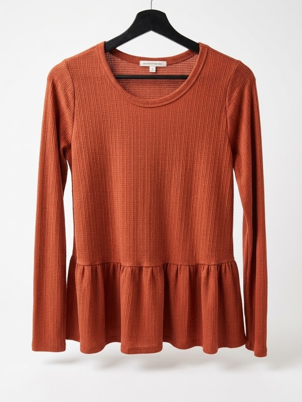 Caution To The Wind Long Sleeve Peplum Top in Rust